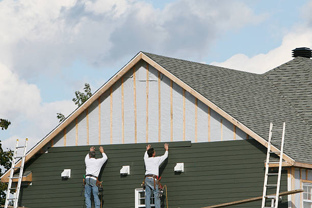 Professional Vinyl Siding technician working in Belmont, MA